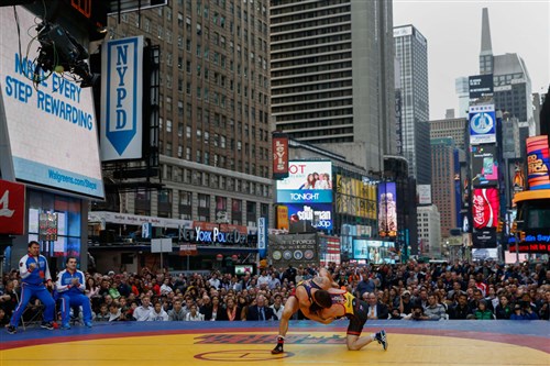 Iran wrestling team line up for New York Times Square match-ups